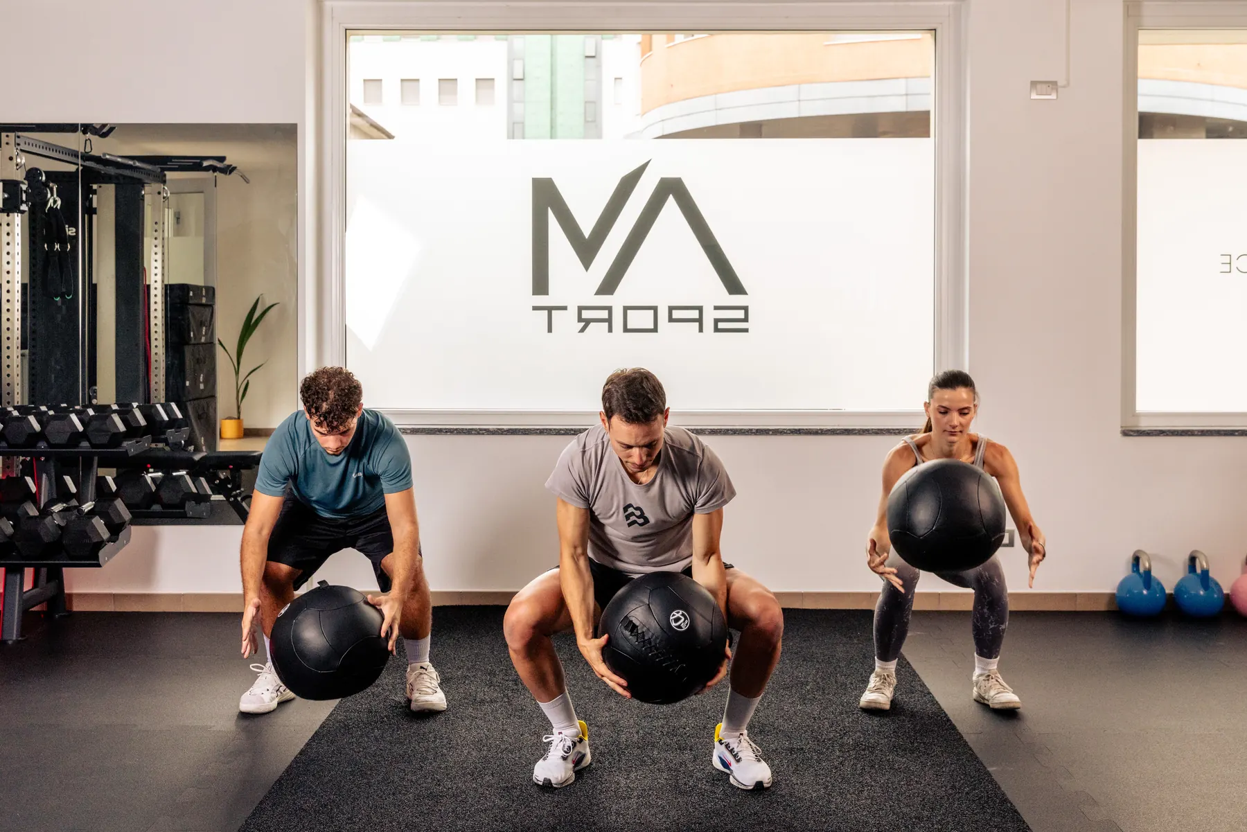 Sessione di personal training one-to-two nello studio AM Sport